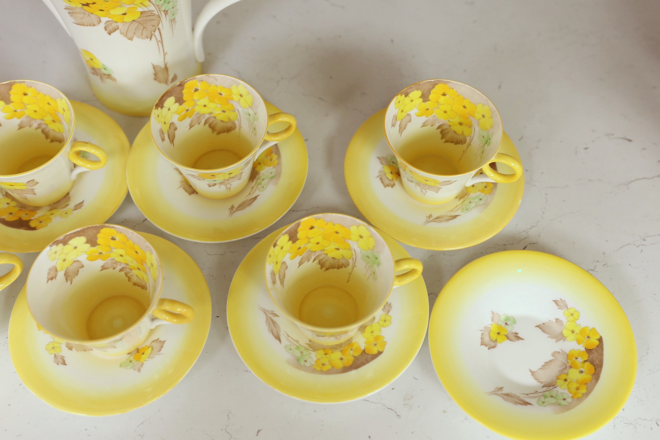 A Shelley “Yellow Phlox”, part tea service, one cup missing and one cup cracked